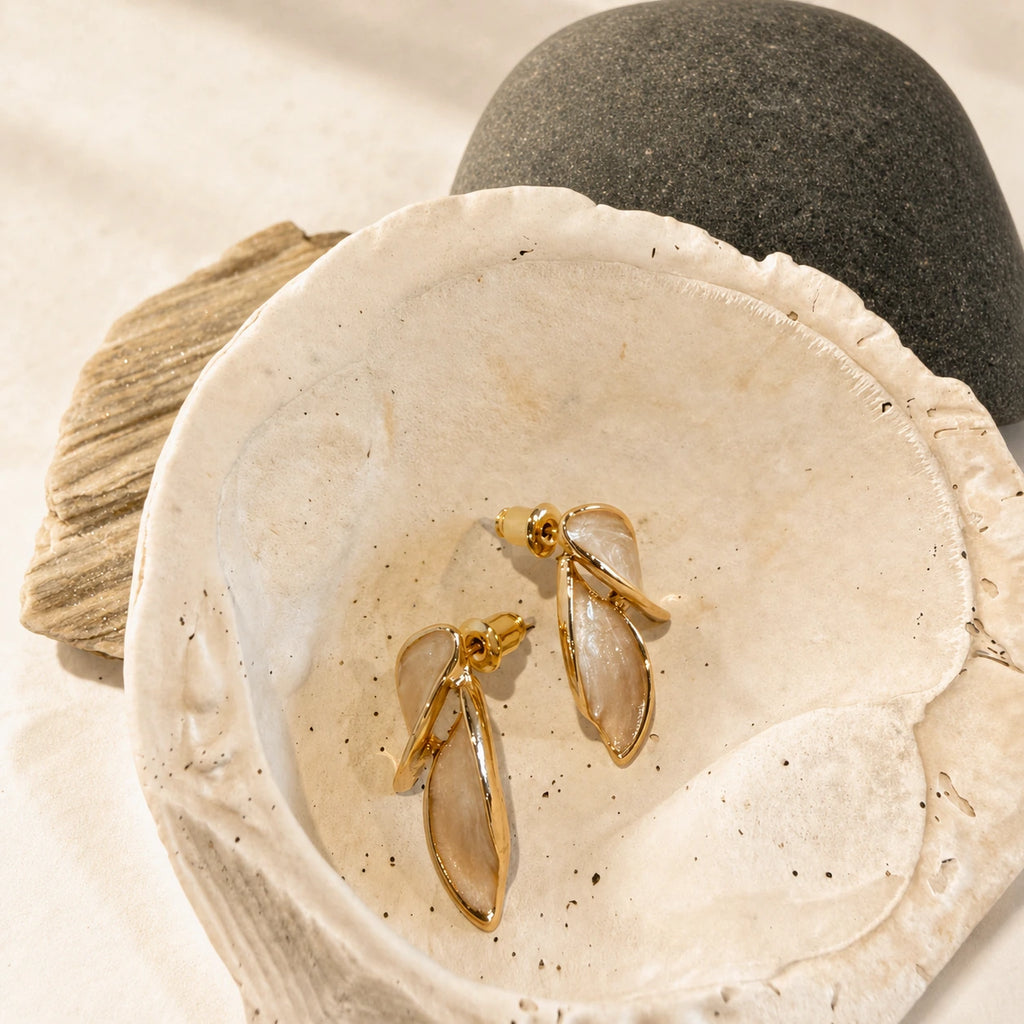 Leaf accent earrings in gold product detail image
