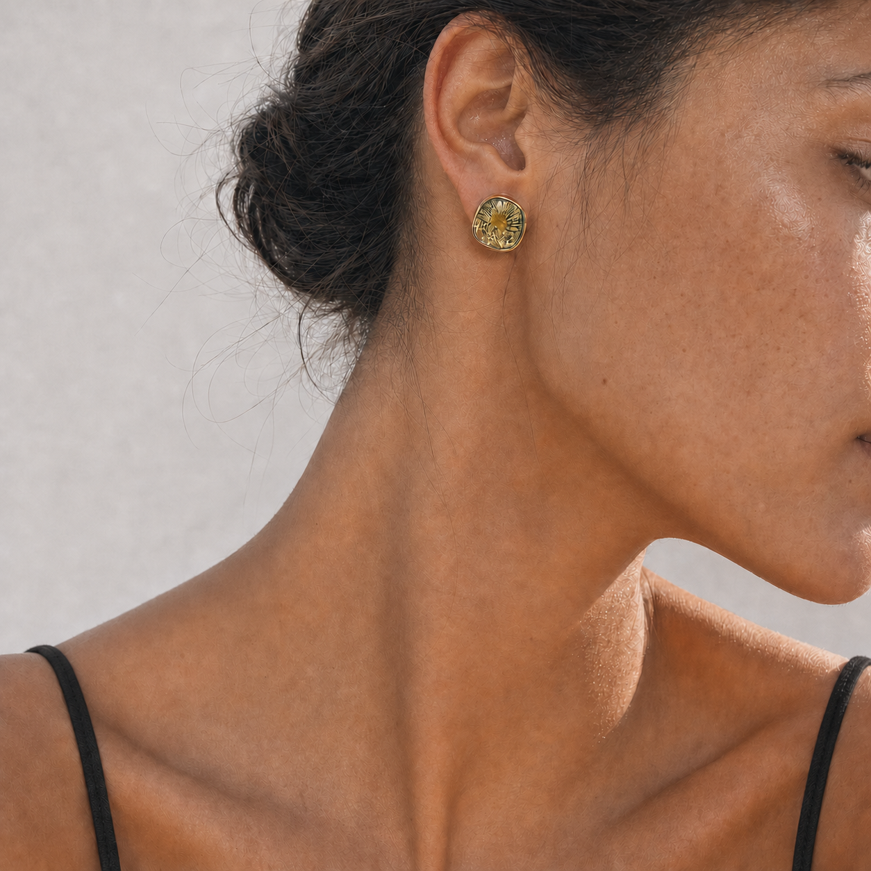 Camellia stud earrings model wearing close-up