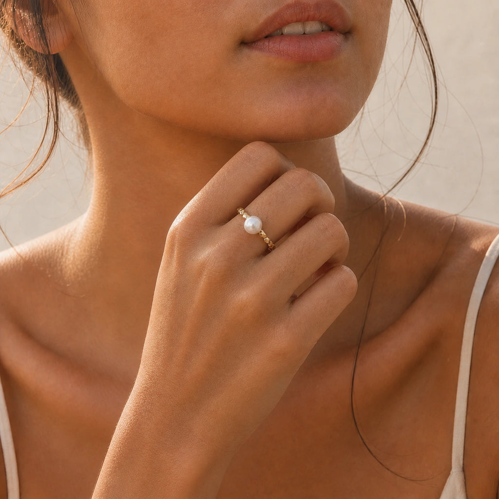 Petite freshwater pearl ring in gold model wearing close-up