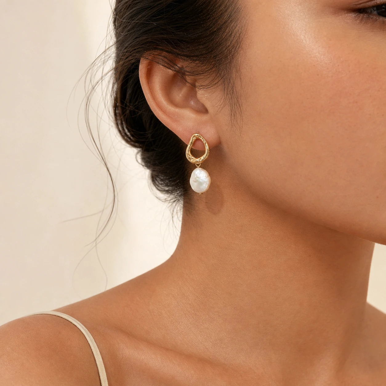 Baroque freshwater pearl drop earrings model wearing close-up
