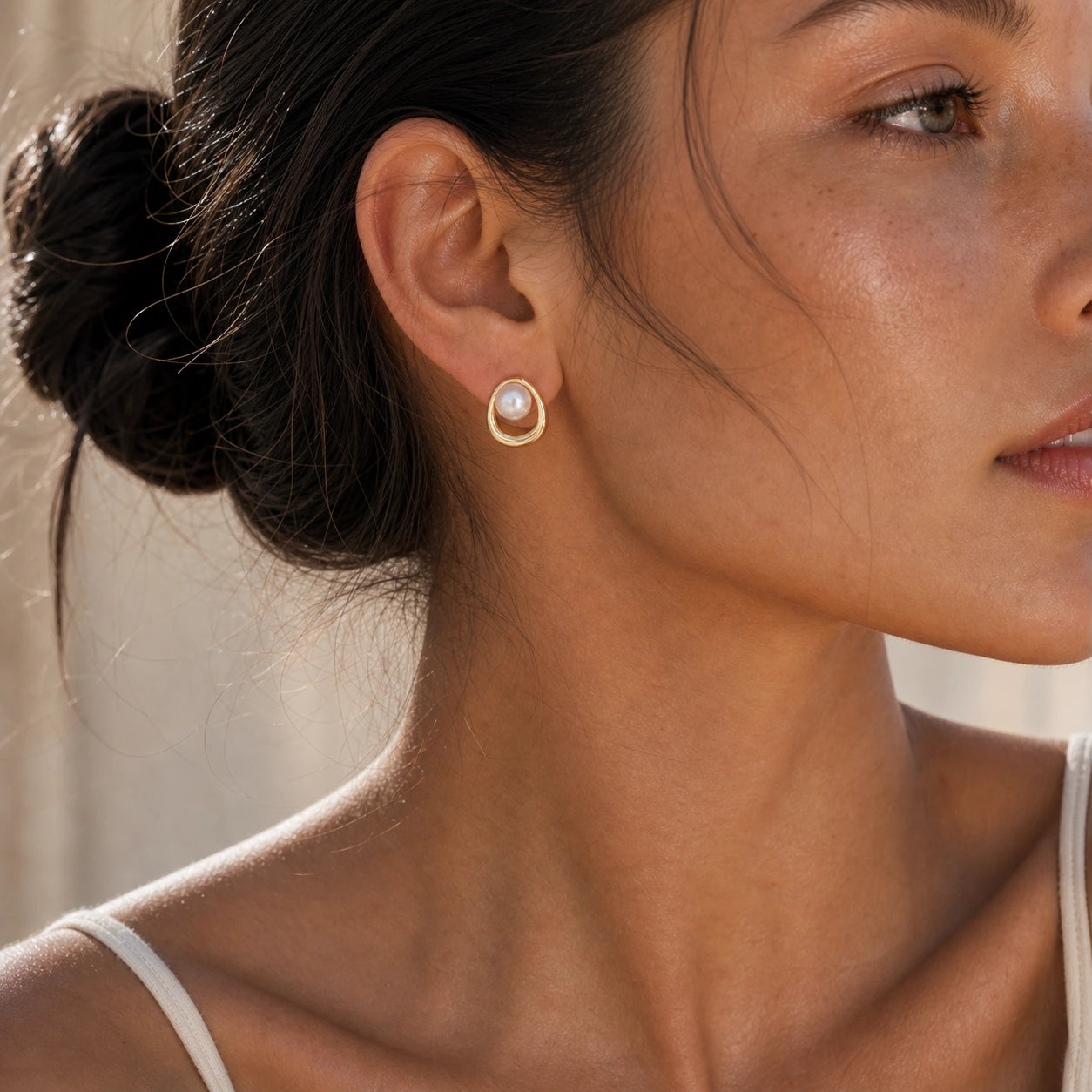 Circle freshwater pearl stud earrings model wearing close-up
