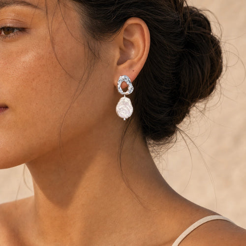 Baroque freshwater pearl drop earrings silver-tone model wearing close-up