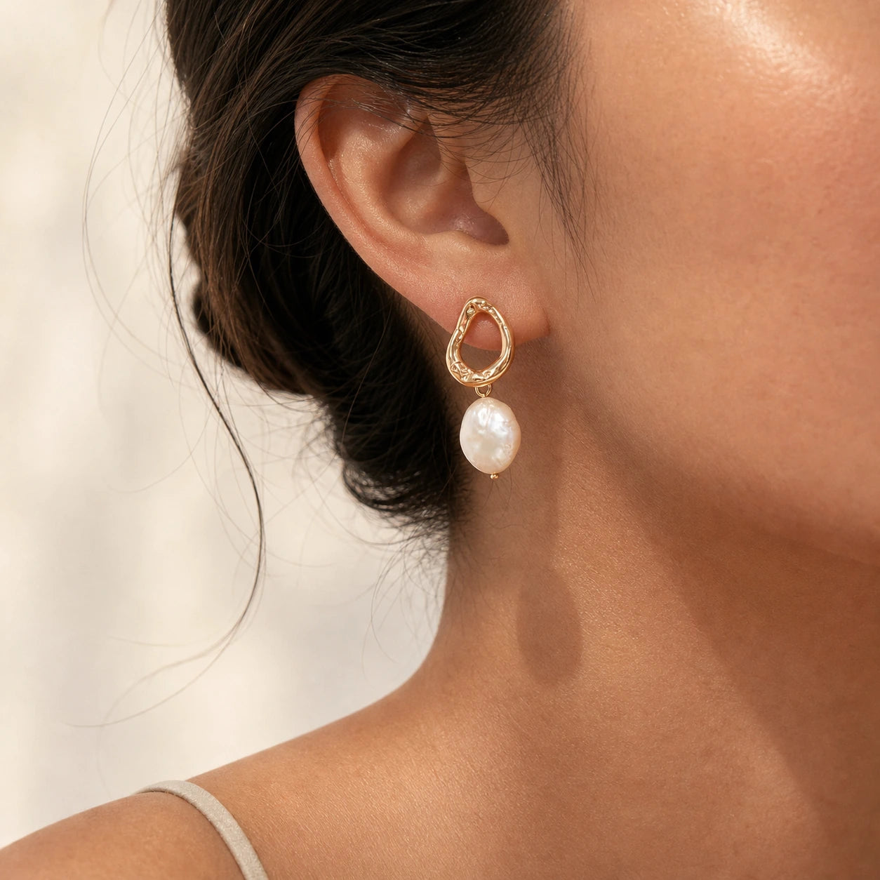Baroque freshwater pearl drop earrings front model view