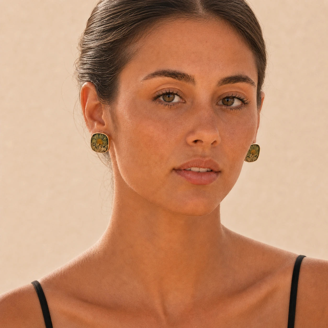 Camellia stud earrings model wearing front view