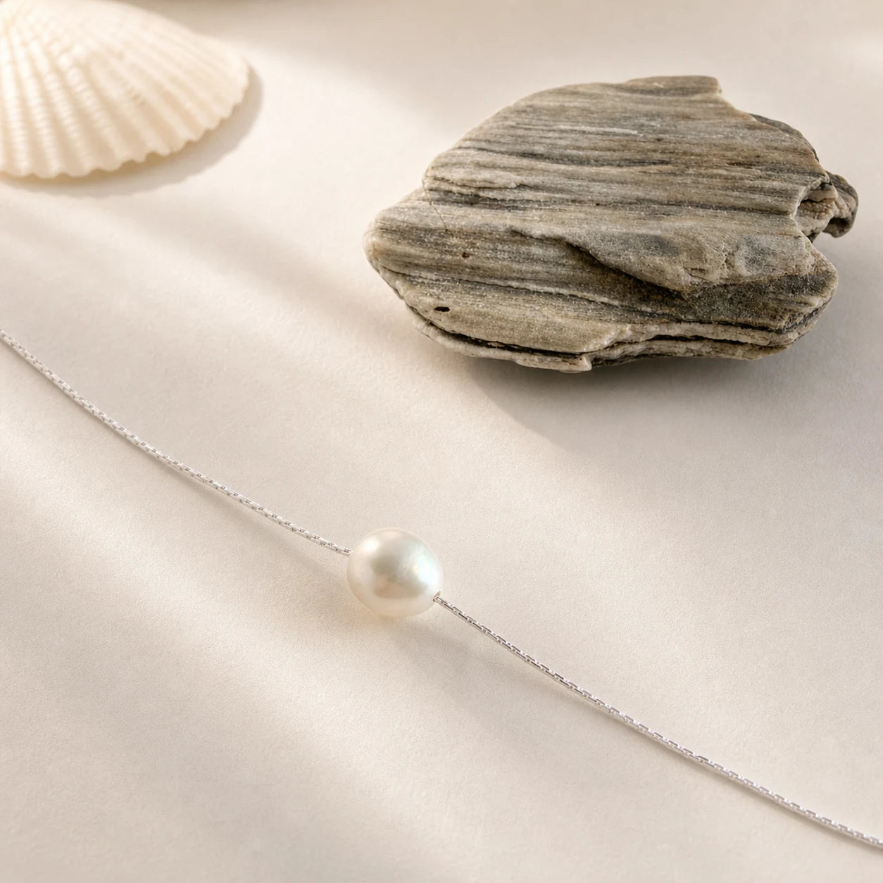 Baroque pearl necklace in silver model wearing portrait