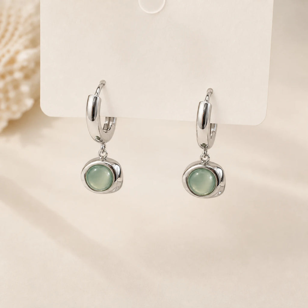 Cat's Eye Drop Earrings in Gold-plated brass with 925 sterling silver hooks displayed in a product styling scene.