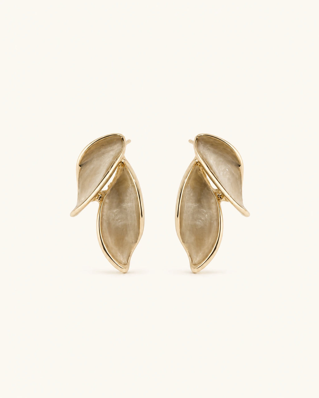 Leaf accent earrings in gold white background product image