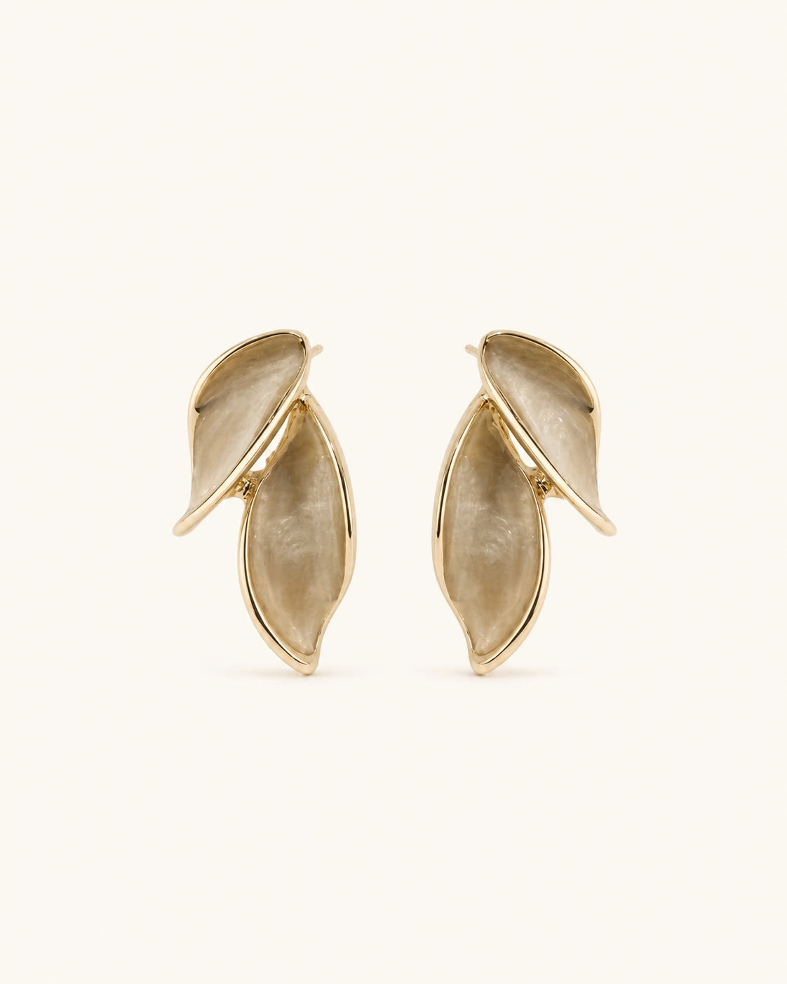 Leaf accent earrings in gold white background product image