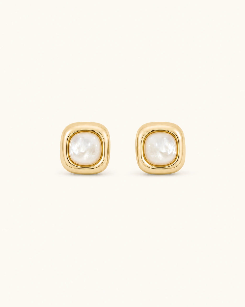 Mother-of-pearl stud earrings in gold white background main image