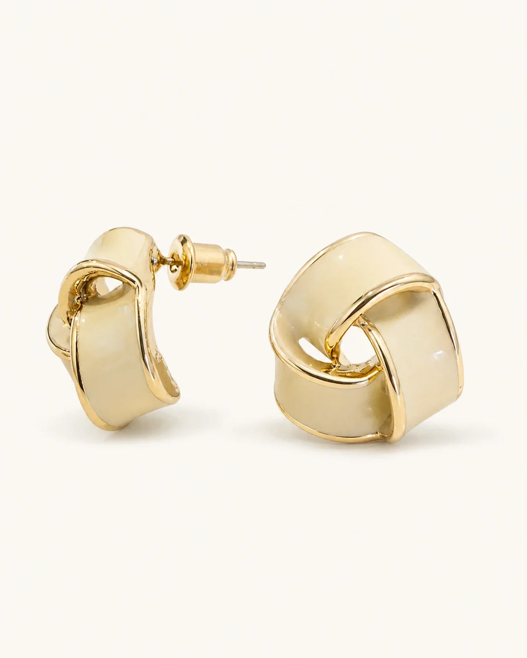 Cream geometric stud earrings white background product image