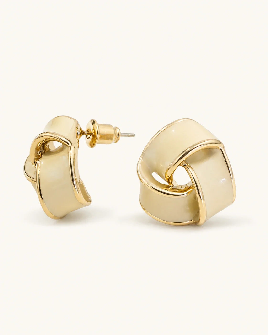 Cream geometric stud earrings white background product image