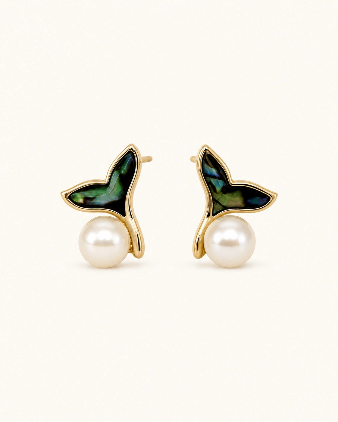 Mermaid tail pearl earrings in gold white background main image