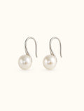 Freshwater pearl hook earrings in silver white background main image