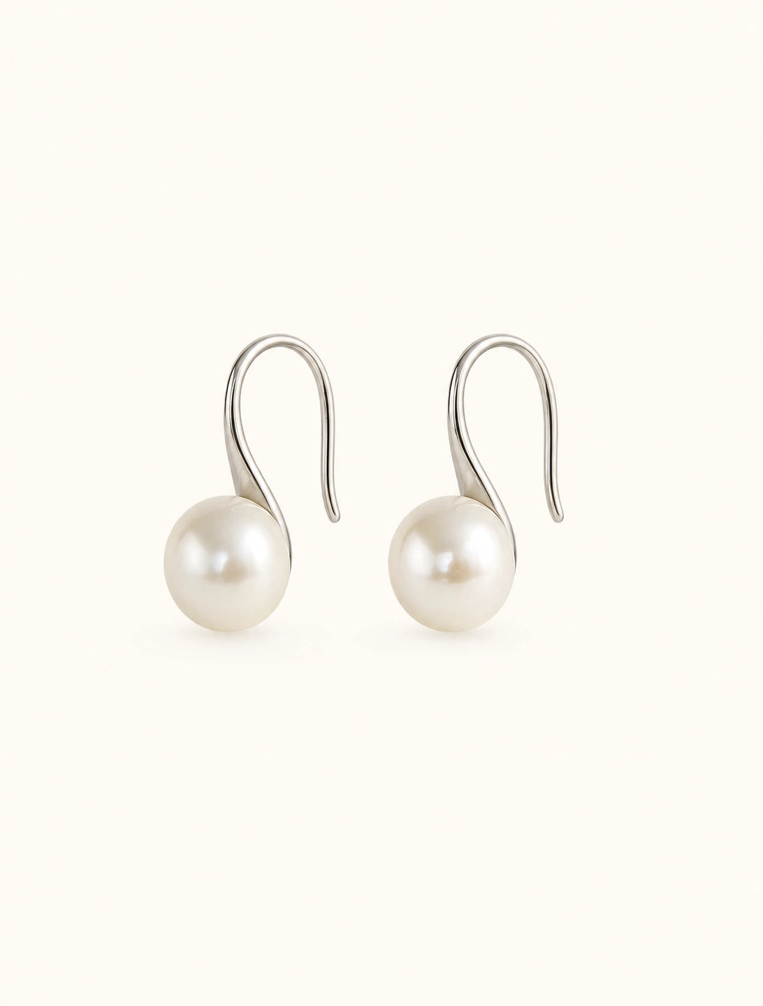 Freshwater pearl hook earrings in silver white background main image