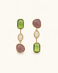 Green crystal drop earrings in gold on clean white background