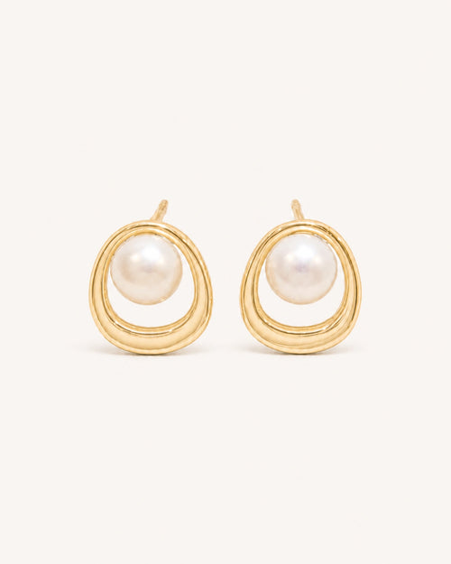 Pearl circle stud earrings in gold white background product image