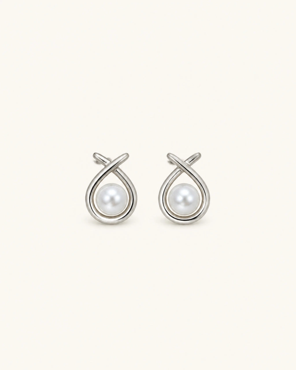 Pearl circle stud earrings in silver white background product image