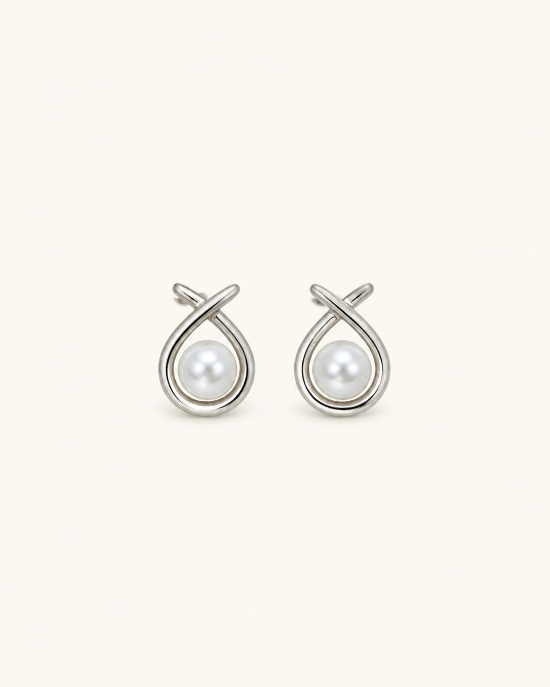 Pearl circle stud earrings in silver white background product image