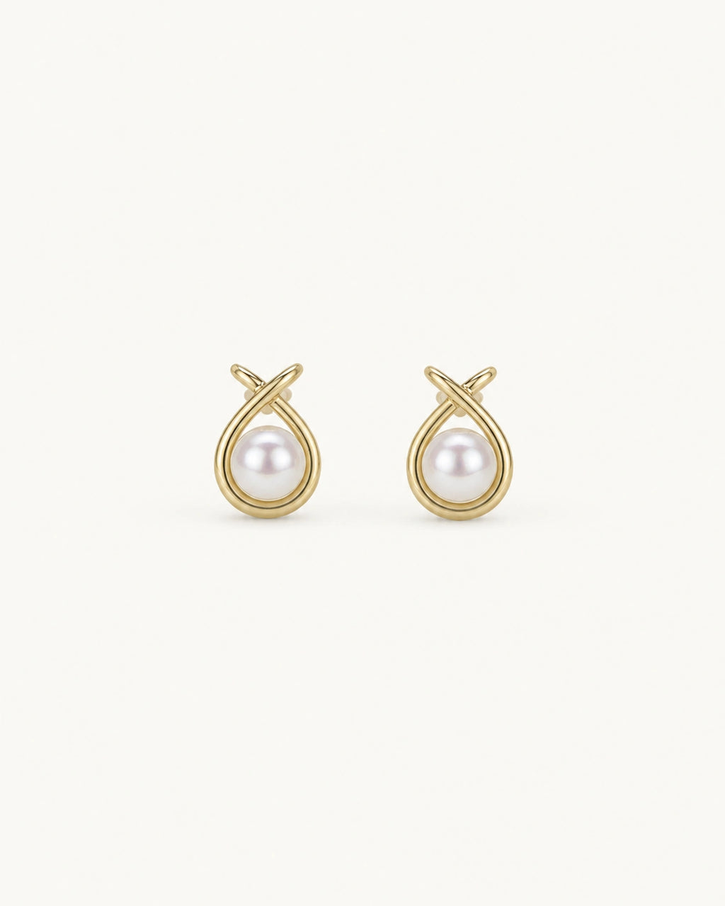 Pearl halo stud earrings in gold white background product image