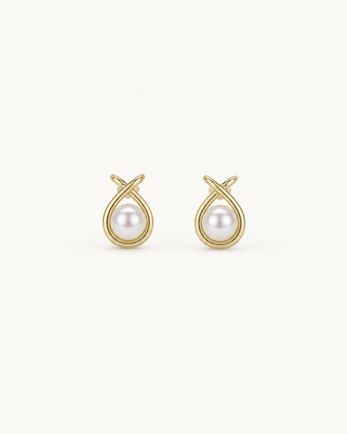 Pearl halo stud earrings in gold white background product image