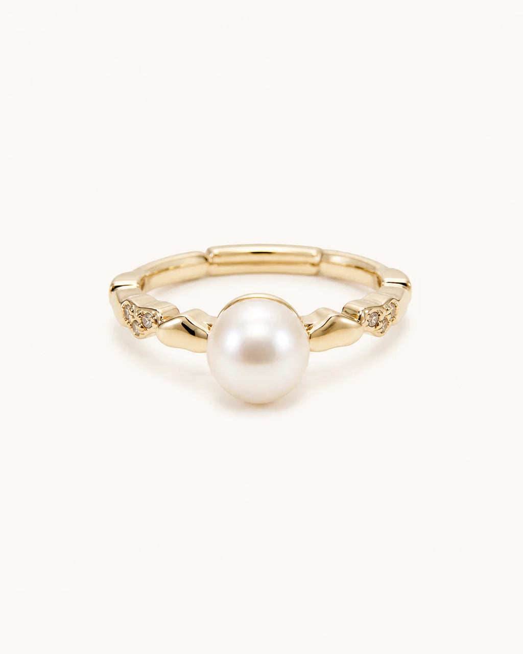Petite freshwater pearl ring in gold on clean white background