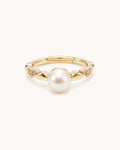 Petite freshwater pearl ring in gold on clean white background