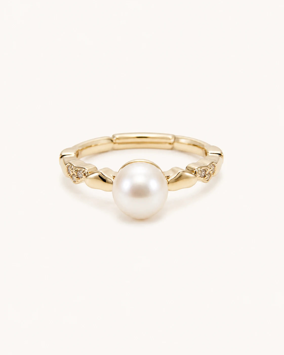 Petite freshwater pearl ring in gold on clean white background