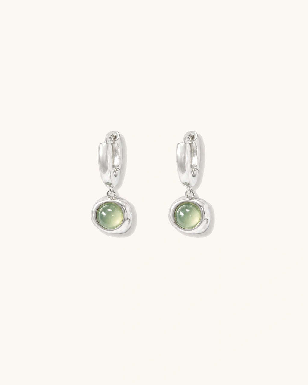 Green cat's eye drop earrings in silver white background product image