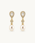 Crystal pearl teardrop earrings in gold on clean white background