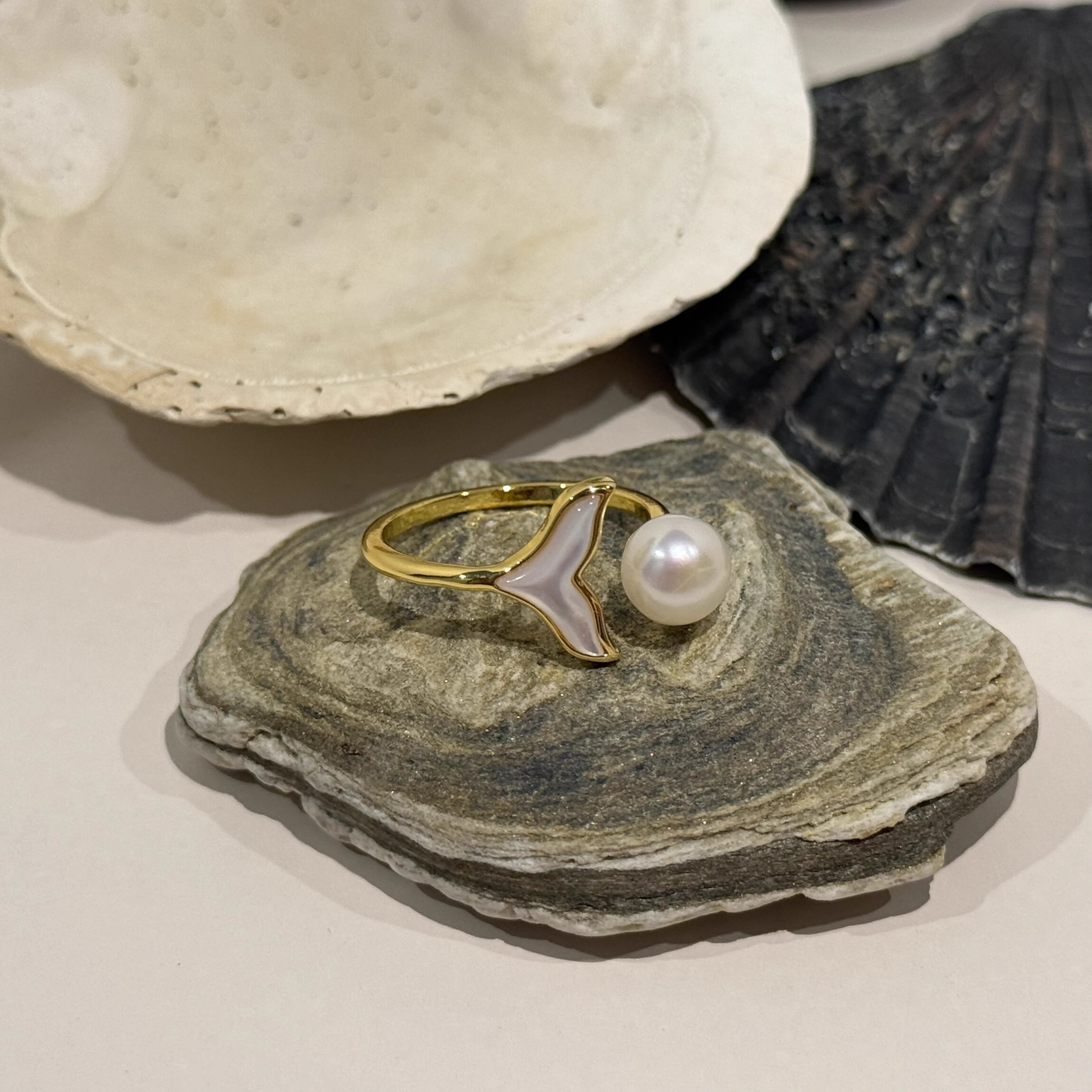 Mermaid Pearl Ring in Gold-plated brass displayed in a product styling scene.
