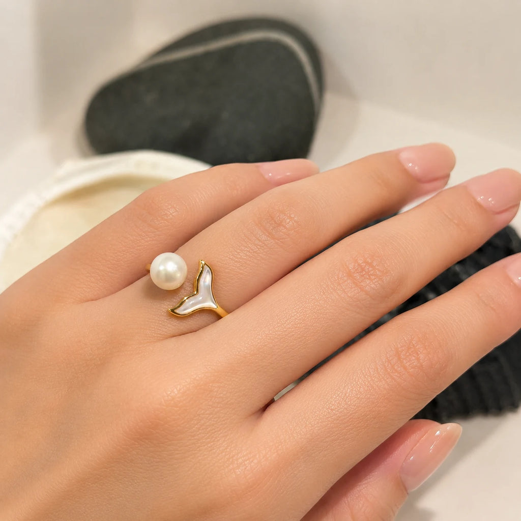 Close-up of mermaid pearl ring in Gold-plated brass.
