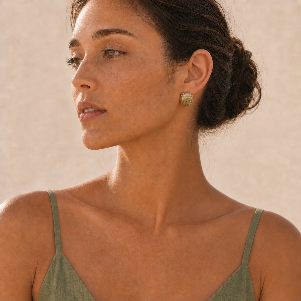 White daisy stud earrings model wearing front view