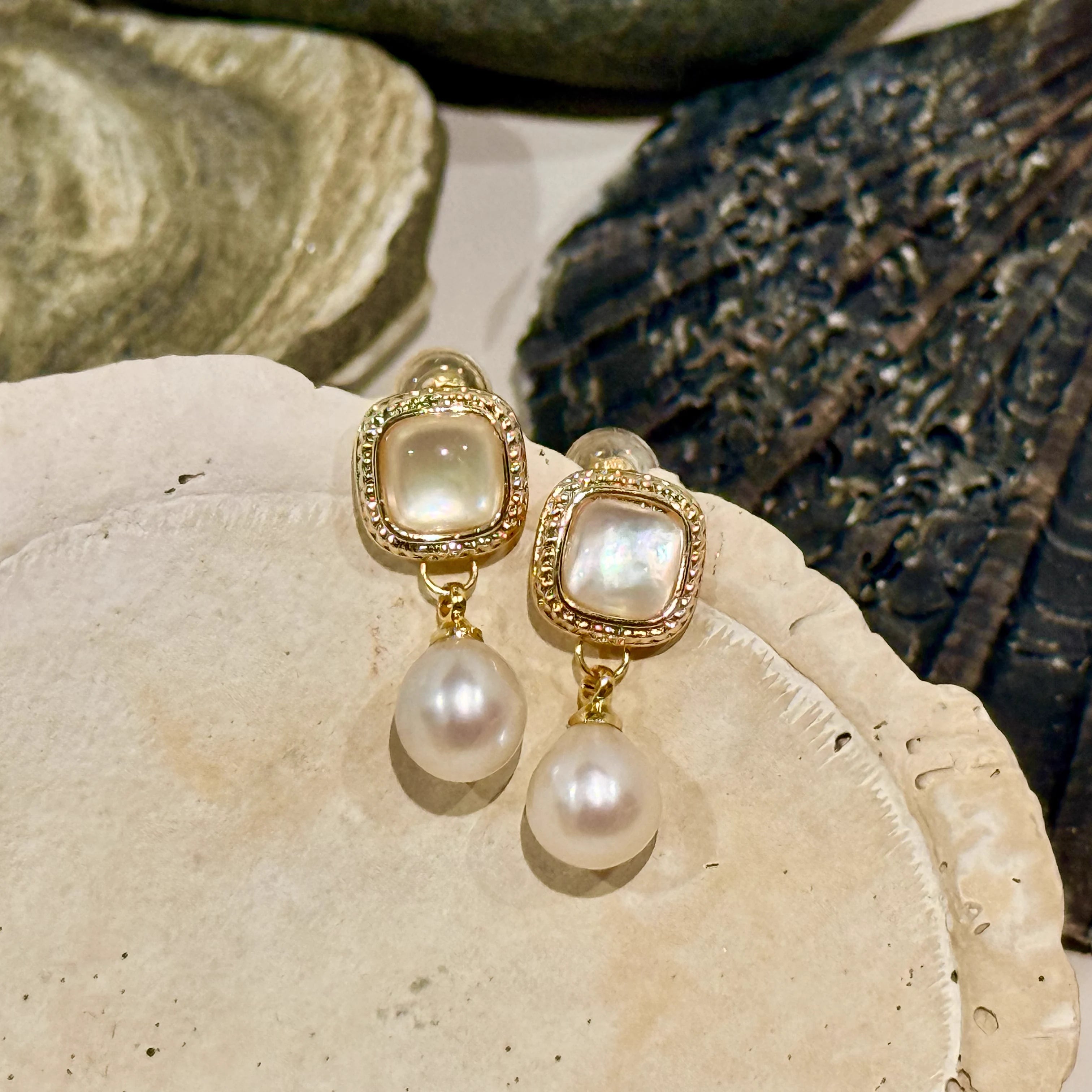 Vintage Mother-of-Pearl Pearl Drop Earrings in Gold-plated brass with 925 sterling silver posts displayed in a product styling scene.